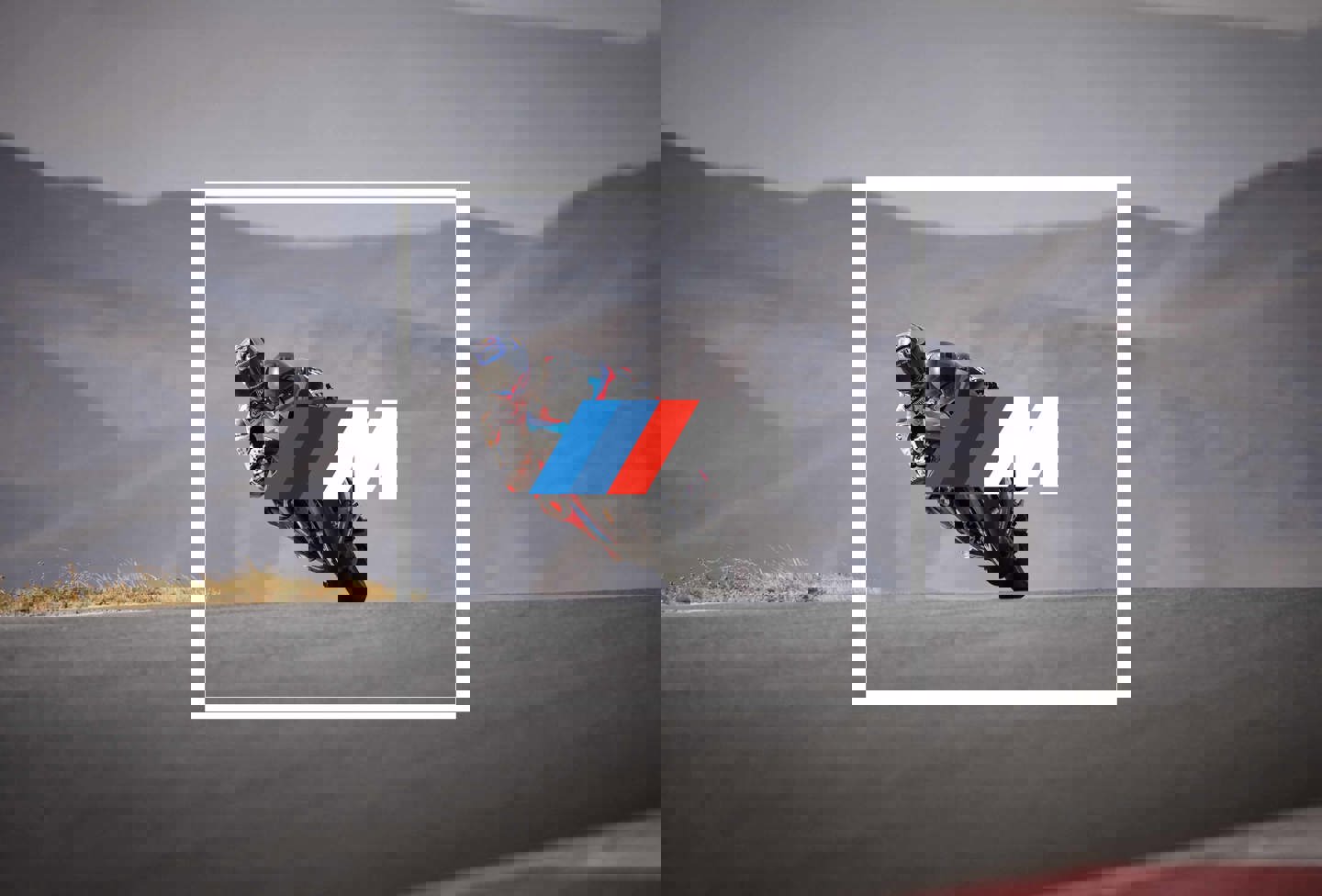 En motorcykelkører på en bane med et rødt og blåt M-logo i midten.